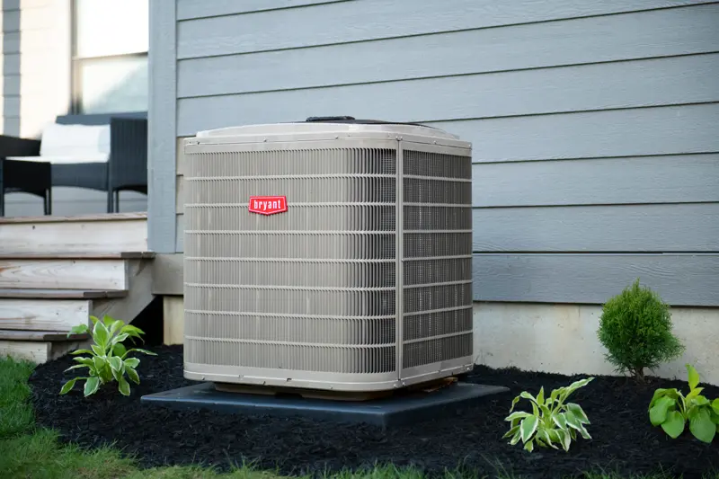 Bryant central air conditioner outside a home